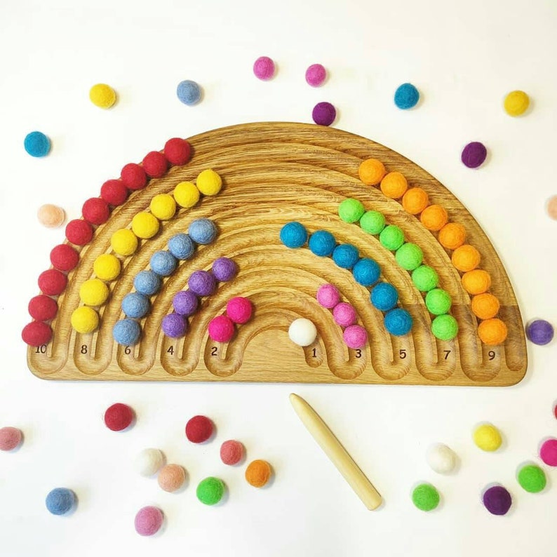 Rainbow tracing board with felt balls